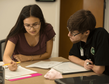 Two students work together on homework