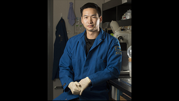 Student posing in a lab