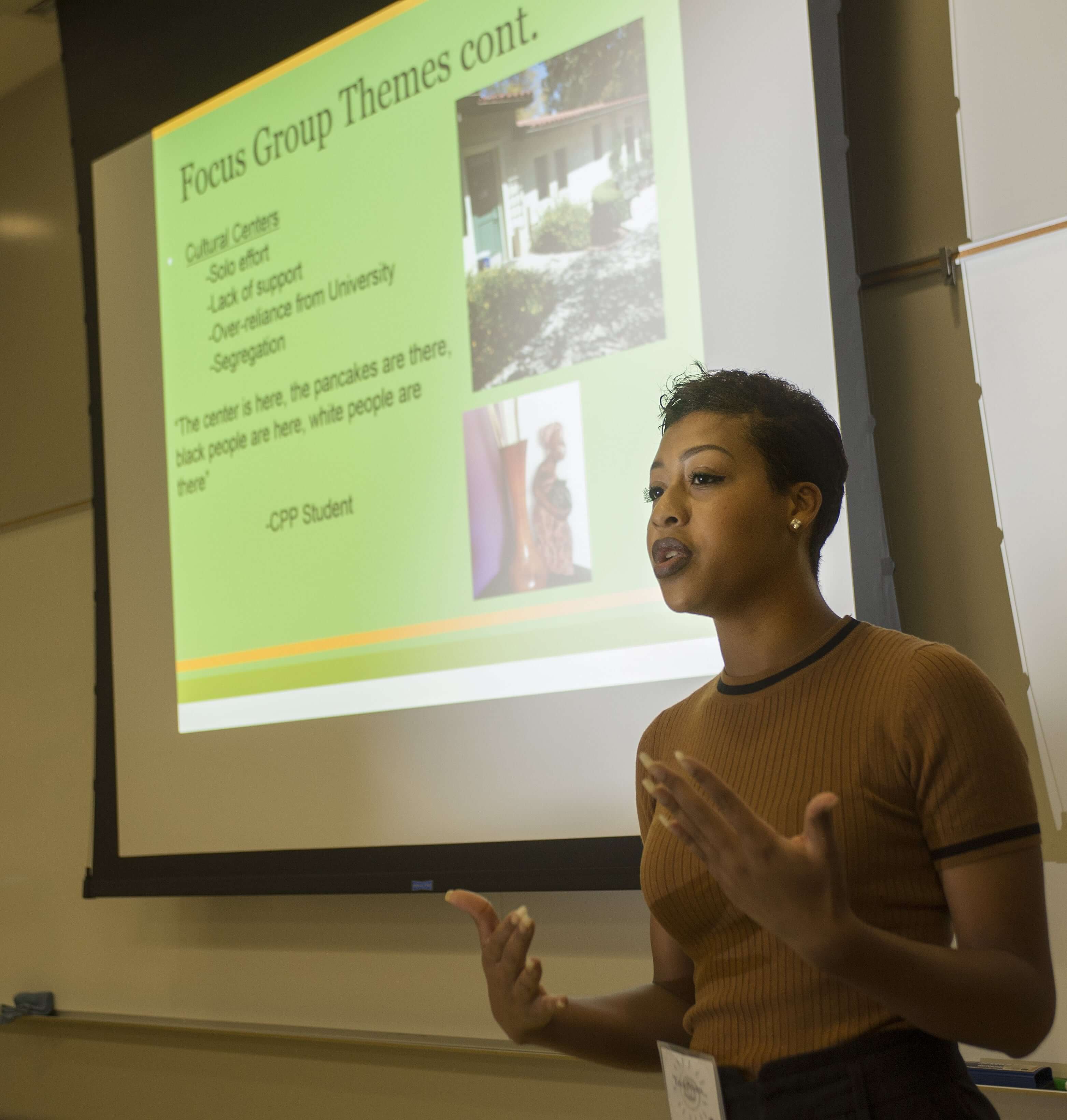 Student presenting their research at conference