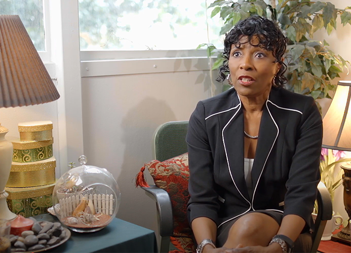 Professor talking in her office