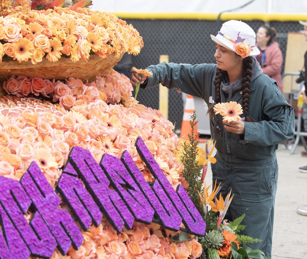 Students pose with the Rose Float judges.