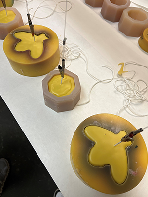 Candle being molded