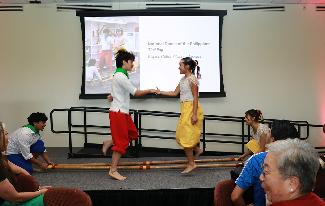 Philipino Cultural Club performs Tinikling.