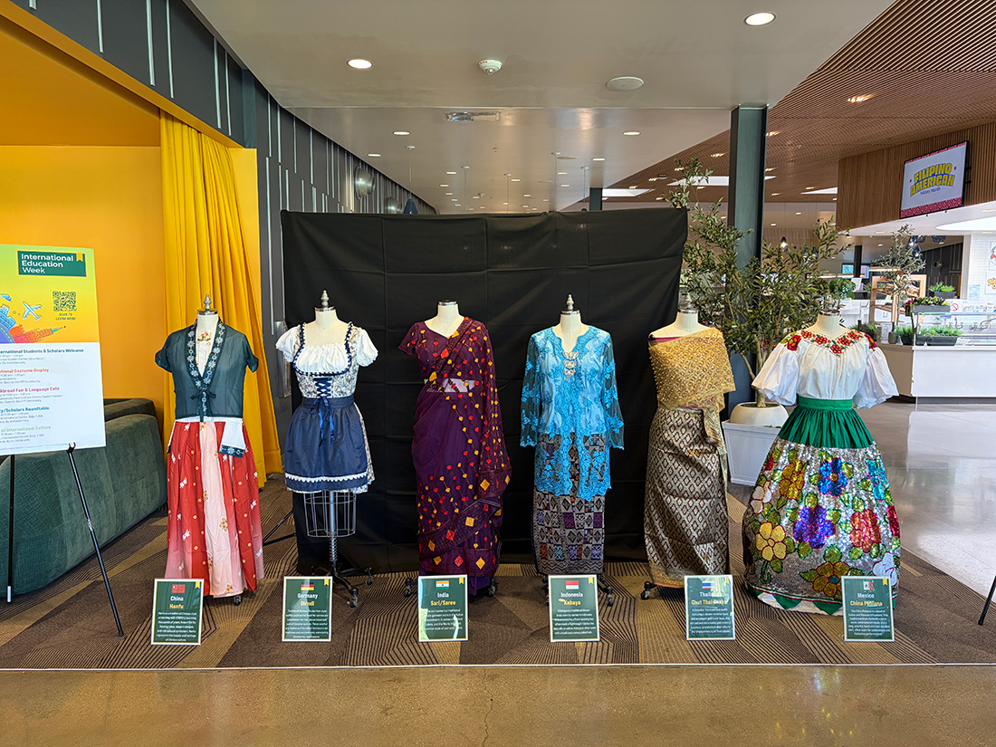 5 International costumes on display during International Education Week