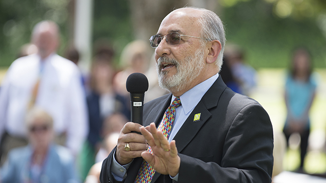 President Ortiz answers a question during the April 2014 Pizza with the Presidents.