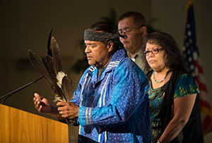 Kim Marcus, a Native American tribal elder, opened the event with a blessing.