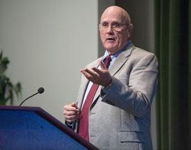 Lawrence G. Abele, an expert on the use of student and institutional data to redesign programs and student support systems, speaks to workshop participants. 