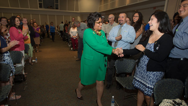 President Soraya M. Coley greets staff members during the 2016 Fall Conference kick off.