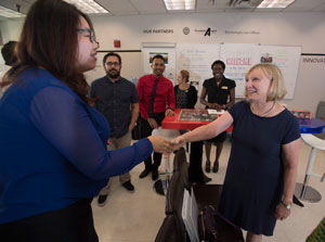 Eisen greets students at the Student Innovation Idea Lab.
