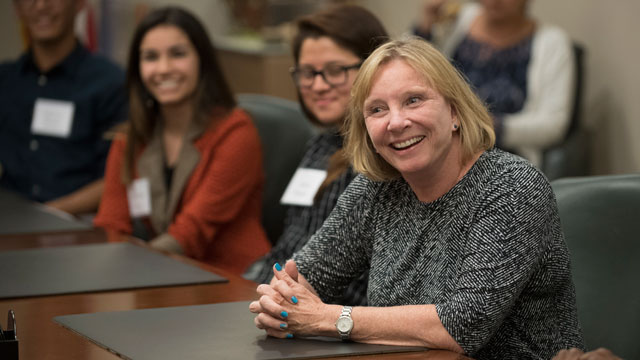 CSU Board of Trustees Chair Rebecca Eisen talks with students.