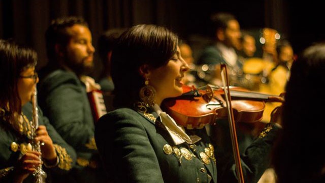 Assistant Professor Jessie Vallejo leads Mariachi Los Broncos de Pomona. Photo Credit: Adriana Roda-Stuart