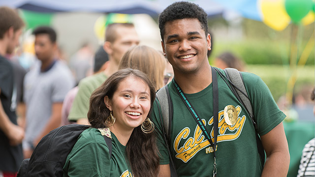 Two Cal Poly Pomona freshman students pose during CPPFest.