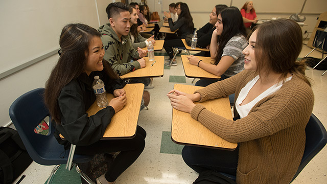 Students in Dorothia Viale's IGE 120 class, Consciousness and Community, take part in a speed dating activity as they learn more about their classmates on the first day of classes at Cal Poly Pomona.