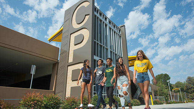 Cal Poly Pomona students and mural near the parking structure.
