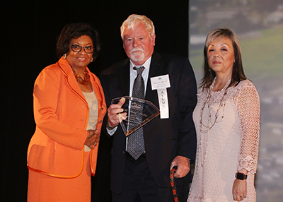 President Coley with Butch Lindley and his wife Vivien