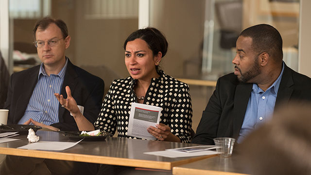 Associate Professor Neha Singh asks a question at the March 16 reunion reception for the Faculty Learning Community, which is now part of the President's new Leadership Excellence Initiative.