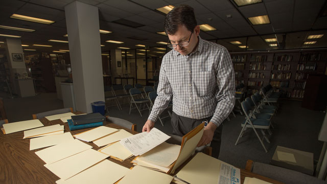 Rob Strauss, a project archivist, was hired in October as part of a federal grant the University Library's Special Collections and Archives received for a project that involves processing close to 600 boxes or archival materials.
