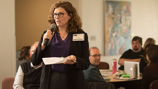 Eileen Cullen, speaks during the WSCUC Town Hall Meeting.