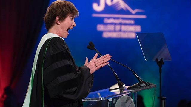 Cal Poly Pomona alumna Diane Miller celebrates receiving an honorary doctorate from CPP at the College of Business Administration 50th anniversary celebration.