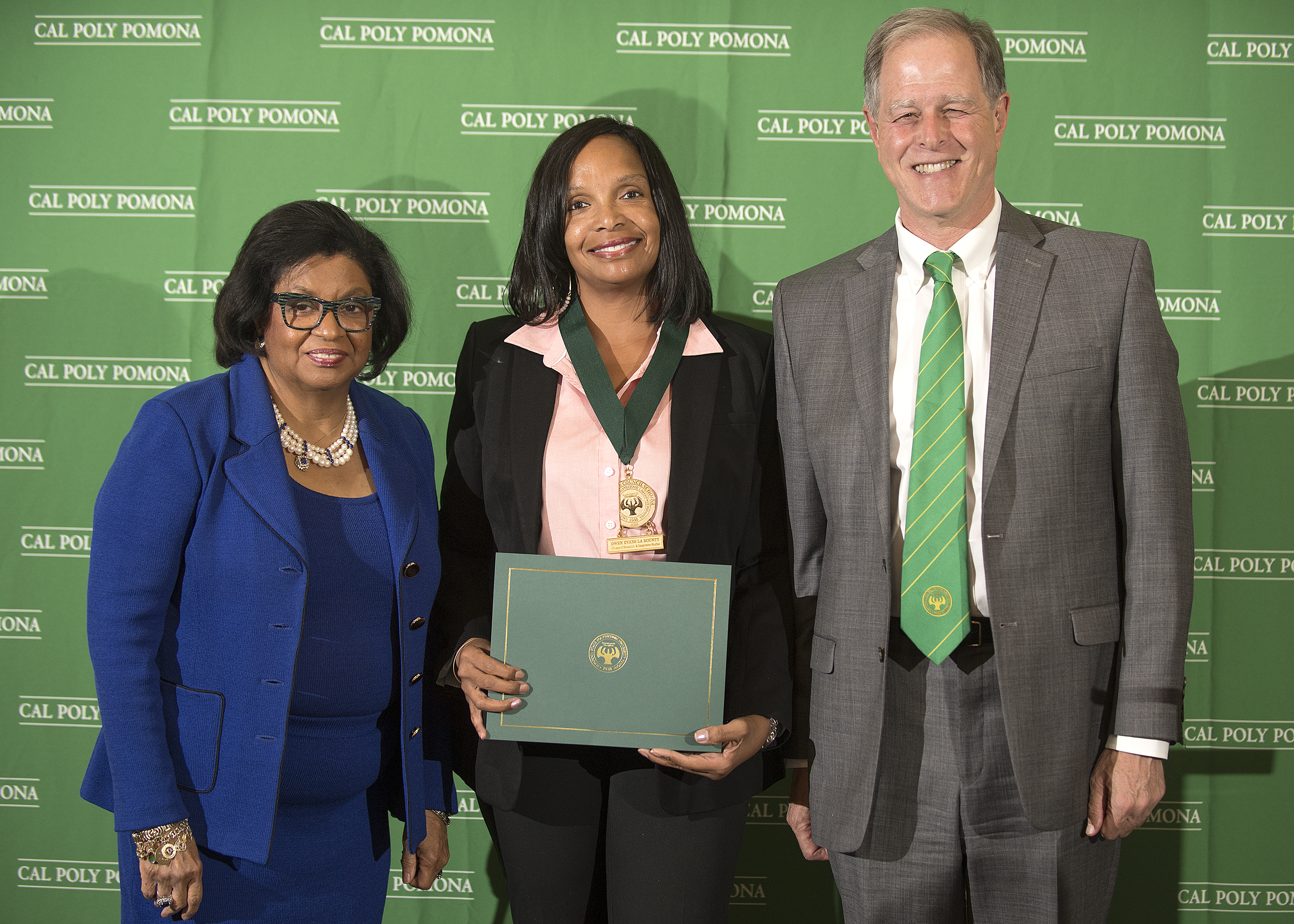 Education doctoral student Marybeth Murray, pictured with University President Soraya M. Coley and CEIS Dean Jeff Passe, was named a Presidential Scholar.