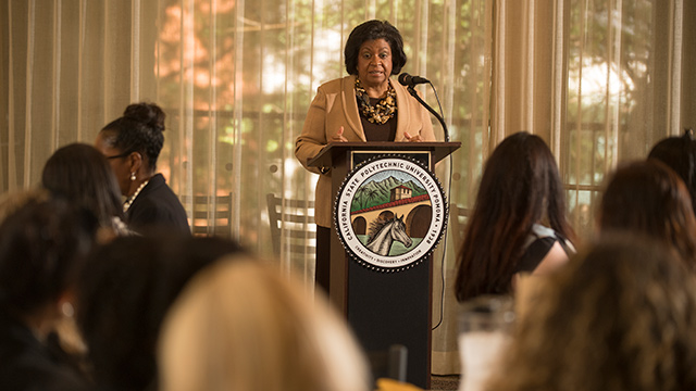 President Coley speaking at the podium.