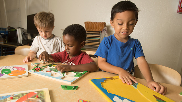 Kids doing puzzles