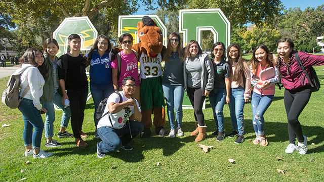 Billy with students
