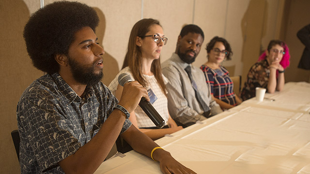 Cal-bridge program students speaking at a symposium