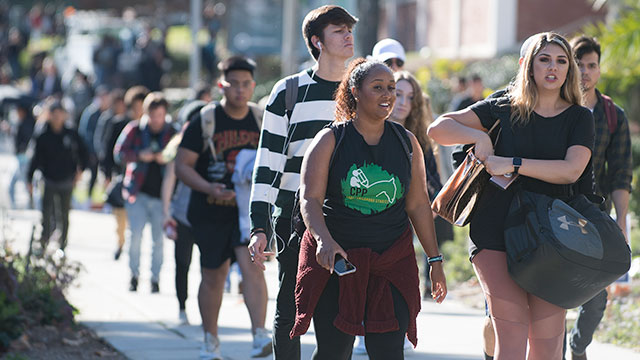 Students walk on campus on the first day of the Fall semester.