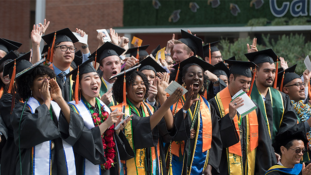 Students celebrate during commencement.