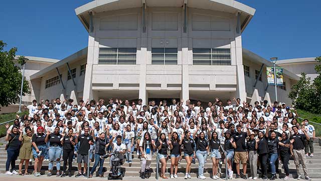Bronco Scholars on the steps of Building 17.