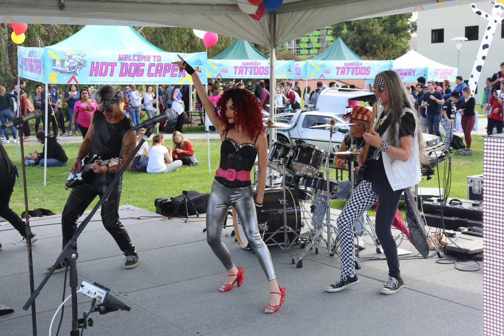 A rock band performs during the 2018 Hot Dog Caper. 