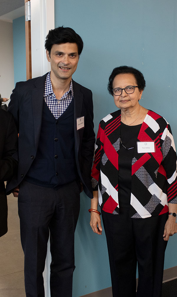 The Ahimsa Center's new Shri Shantinath Endowed Chair, Aishwary Kumar (left) next to the inaugural chair and center founder, Tara Sethia.