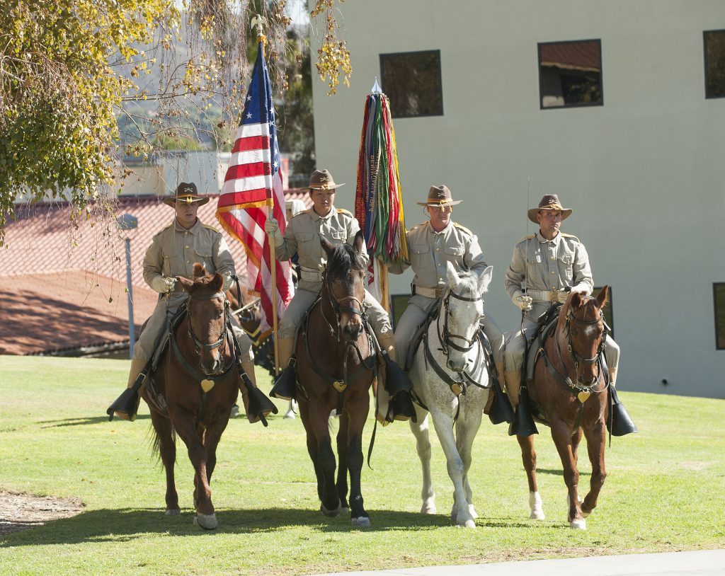 11th Armored Calvary Regiment, Regimental Support Squadron Horse Detatchment from Ft. Irwin presents the colors at the 2015 Veterans Day celebration in University Park November 12, 2015.