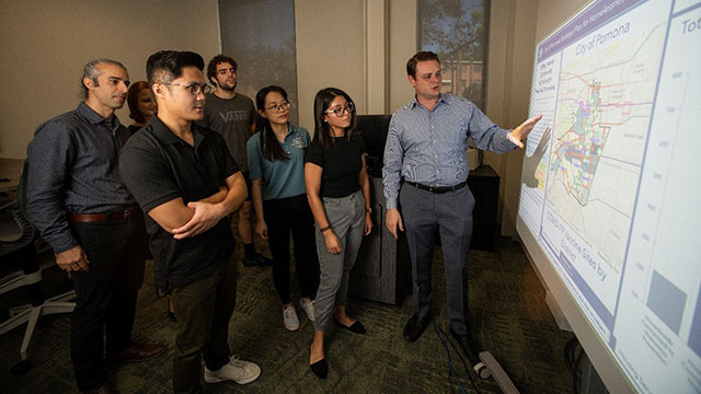 students look at a presentation