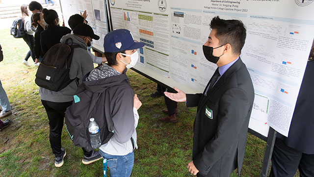 Research students present to the community during an RSCA conference.