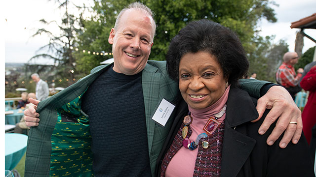 Alumnus Larry Gates and CPP president Soraya M. Coley.