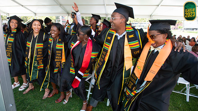 Graduates celebrating during Commencement