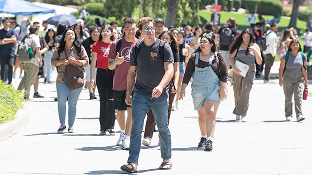 Students walk across campus on the first day of fall classes.