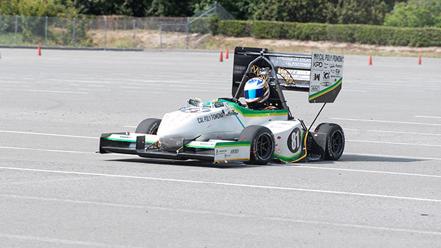 Formula SAE student driving during a test run.