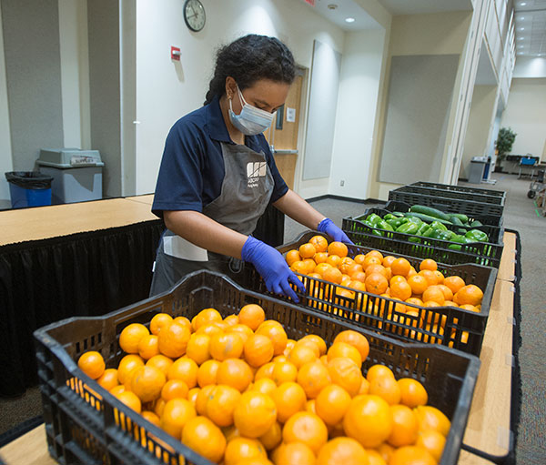 Vegetables and fruit get sorted at the Poly Pantry. 
