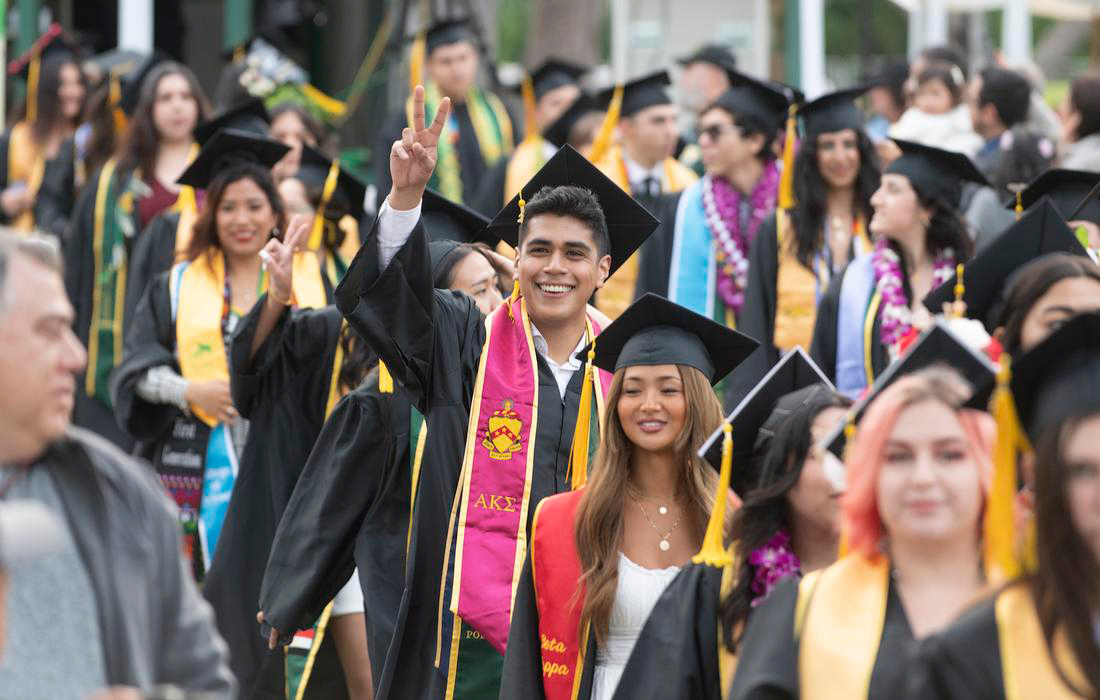 Graduates walking during Commencement