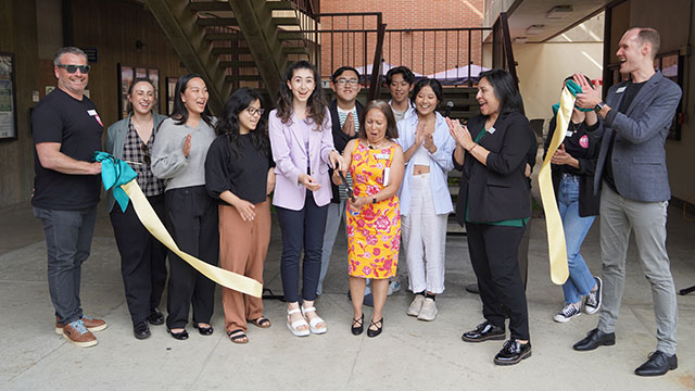 Photo by: David Sedillo. Dean Akers, Student Affairs leadership, and ENV students celebrate the launch of the Wellness Collaboration on Sept. 20.