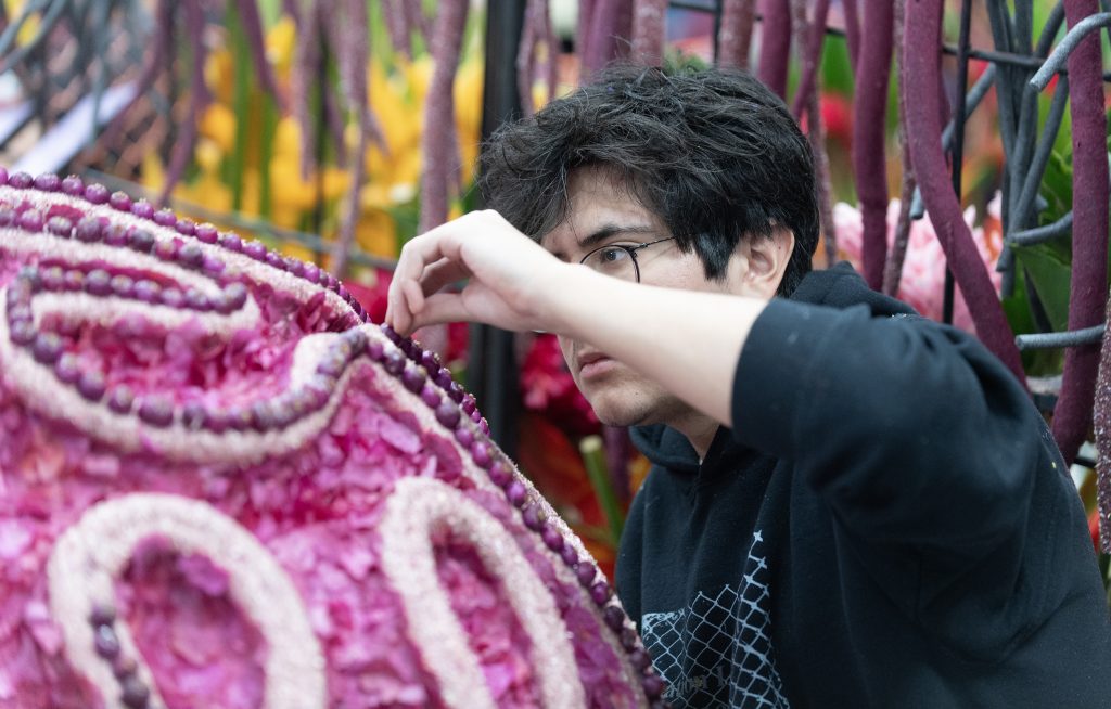 Brain Coral is decorated during Deco Week at the Rose Bowl in Pasadena for the Cal Poly Universities Rose Float, Shock and Roll December 29, 2023.