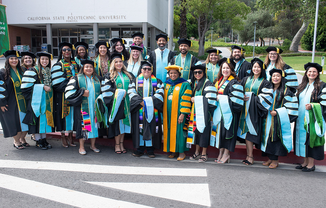 ENV Graduate students smile during the 2023 commencement ceremonies.