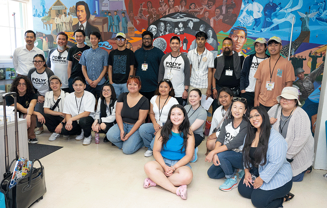 Students smile for a group photo.