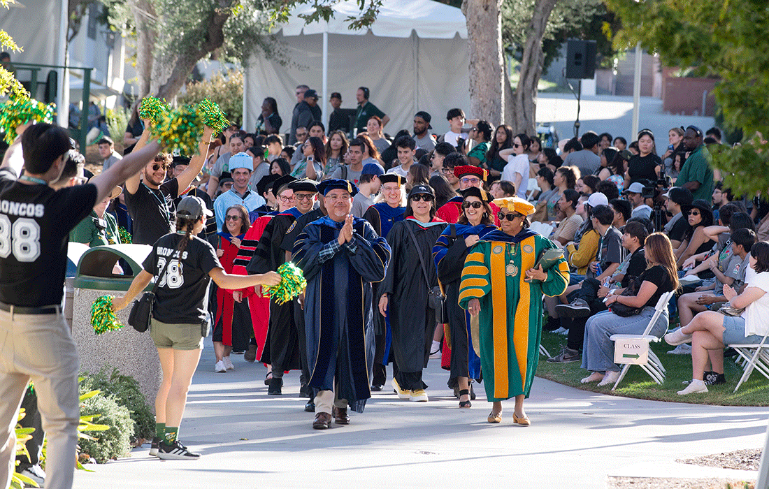 President Coley processes through the Quad.