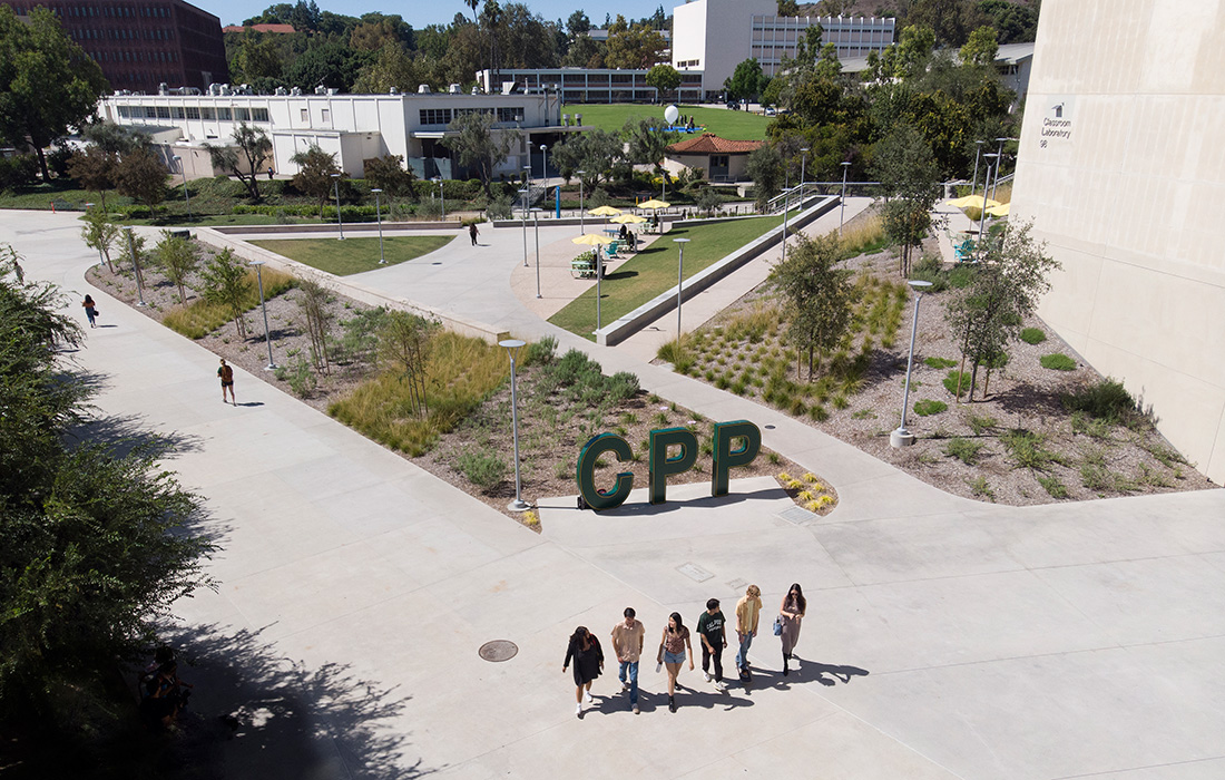 Aerial view of students walking by the CPP Letters at the Park at 98.