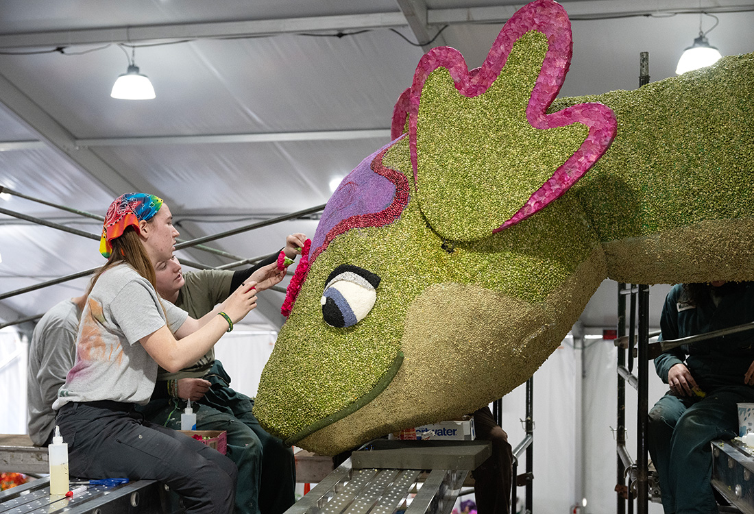 Two students work on Nessie the Lochness Monster