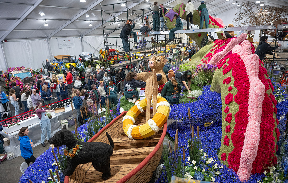 The 2025 Cal Poly Universities Rose Float being decorated by students and volunteers